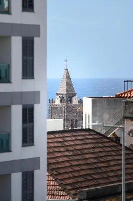 a view of a church from the roof of a building at Casa da Avó Luísa in Funchal