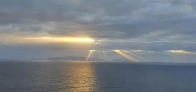 a view of the ocean with the sun in the sky at Sea&Sunrise Village in Caniço