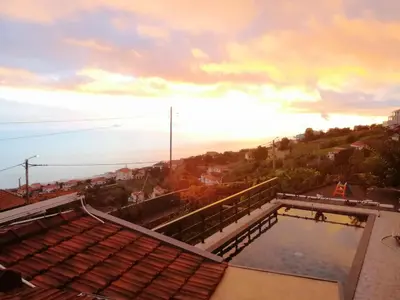 a view from the roof of a house with a pool at Villa do Italiane in Estreito da Calheta