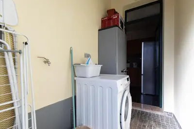 a white washer and dryer in a room at Casa da Jackie by Rent-a-key in Funchal
