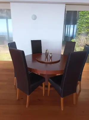 a glass coffee table in front of a couch at Super luxury villa Views and panoramic lift in Funchal