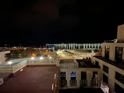 a view of a parking lot at night at Infante Home in Funchal