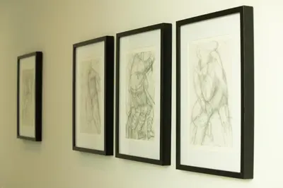 a group of drawings of human skeletons on a wall at Villa Noelia Ocean View in Prazeres