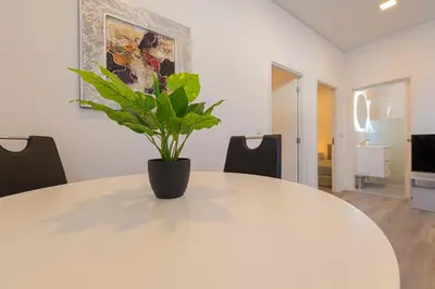 a potted plant sitting on a table in a room at VIP Baía Beach B in Machico