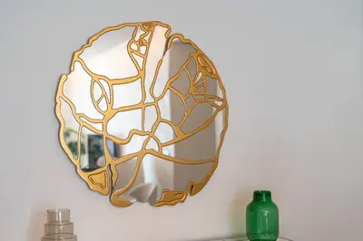 a gold and white mirror hanging on a wall at La Vie Funchal - City Center & Free Park in Funchal