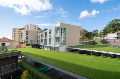 an image of a house with a green lawn at Maravilhas II by An Island Apart in Funchal