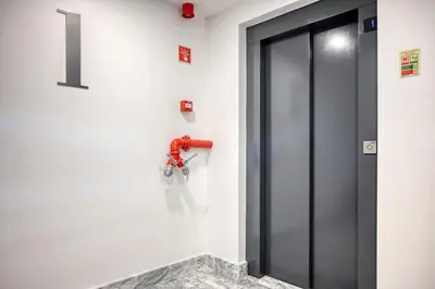 a door in a building with a number one on the wall at BSE15 Apartments 1B, a Home in Madeira in Funchal