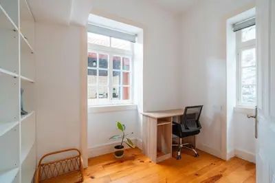 a home office with a desk and a chair at Villa Oasis Sea View - 3 Bedrooms in Funchal