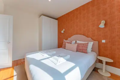 a bedroom with a bed with two towels on it at FLH Funchal A Quinta do Conde in Funchal