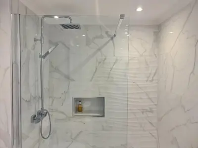 a shower with a glass door in a bathroom at Step To The Sea 4, by Pausa Holiday Rentals in Funchal