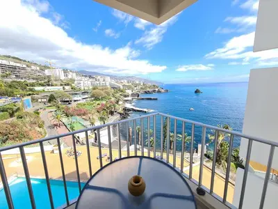 a balcony with a view of the ocean at Step To The Sea 4, by Pausa Holiday Rentals in Funchal