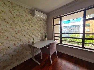 a dining room with a table and a window at Stay In Arriaga Avenue 09, by Pausa H. Rentals in Funchal