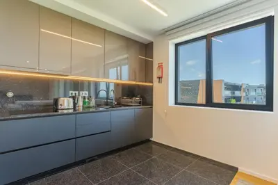 a kitchen with a sink and a window at Renala III, by Pausa Holiday Rentals in Funchal
