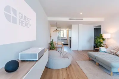 a living room with a couch and a table at GuestReady - Elegant Madeira Retreat in Funchal