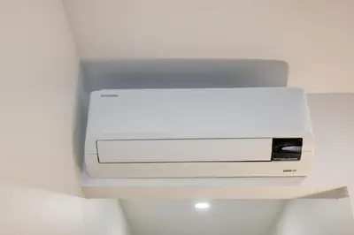 a computer monitor on a wall in a room at BSE15 Apartments 4J, a Home in Madeira in Funchal
