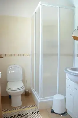a bathroom with a shower and a toilet and a sink at Wanderlust - Beautiful Villa in Aljezur in Aljezur