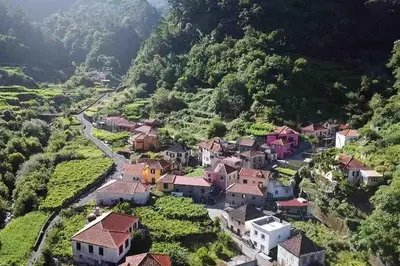an aerial view of a village on a mountain at Roots Guesthouse - A in São Vicente