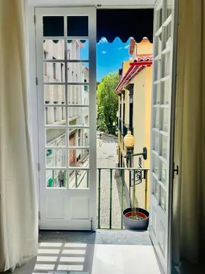 an open door with a view of a street at Carreira Solar by Olá Madeira in Funchal