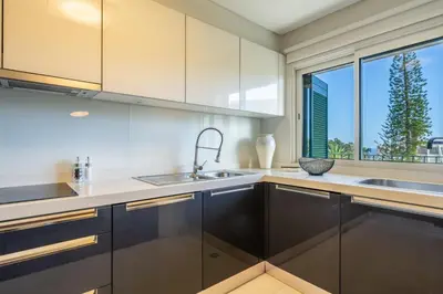 a kitchen with a sink and a window at Manny Quinta Vitória, by Pausa Holiday Rentals in Funchal