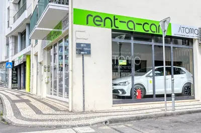 a car in the window of a car dealership at BSE15 Apartments 3I, a Home in Madeira in Funchal