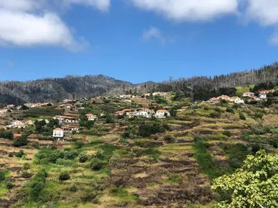 a small town on a hill with houses at Casa Kiri in Calheta