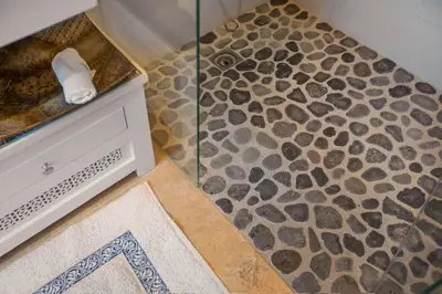 a bathroom with a shower with a walk in shower at Atelier by Real Vision in Funchal