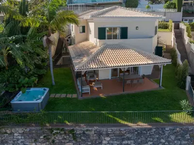 an aerial view of a house with a swimming pool at Sublime View Villa by Atlantic Holiday in Funchal