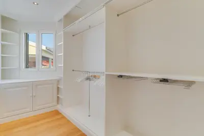 a white bathroom with a glass shower stall at Sublime View Villa by Atlantic Holiday in Funchal