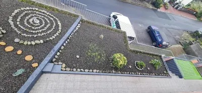 an aerial view of a garden with a car parked at Alcantara Bell in Feiteiras