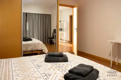 a bathroom with a toilet and a sink and a shower at Villa Karibo by ESCAPE to Madeira in Achada de Cima