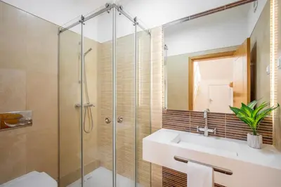 a bathroom with a sink and a shower at Paradise Beach Villa by Blue Diamond 18 in Lagos