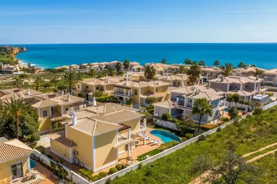an image of a villa with the ocean in the background at Paradise Beach Villa by Blue Diamond 18 in Lagos