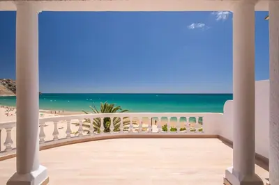 a balcony with a view of the beach at Beach View Apartment Praia da Luz by Blue Diamond 24-1F in Luz