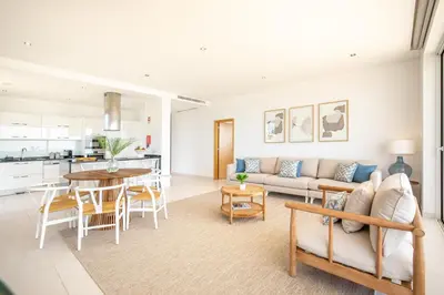 a living room with a couch and a table at Beach View Apartment by Blue Diamond 101 in Lagos