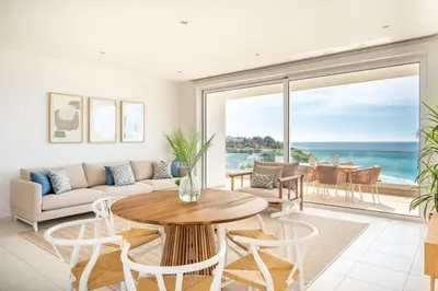 a living room with a couch and a table at Beach View Apartment by Blue Diamond 101 in Lagos