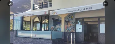 a building with a mural on the side of it at A Casa da Minha Mãe in Paul do Mar
