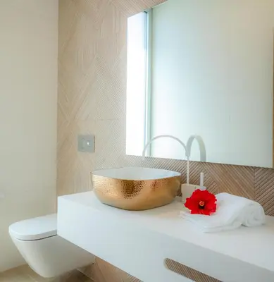 a bathroom with a sink and a bowl on a counter at Beach View Villa by Blue Diamond 55 in Lagos