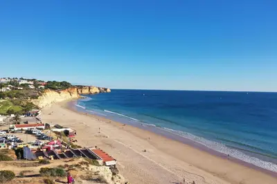 a beach with a group of people and the ocean at Beach View Villa by Blue Diamond 55 in Lagos