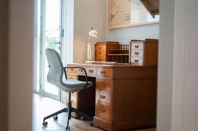an office with a desk and a chair in a room at Blue Boat by Madeira Best Apartments in Funchal