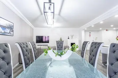 a dining room with a table and chairs at Imperatriz Madeira Apartment in Funchal