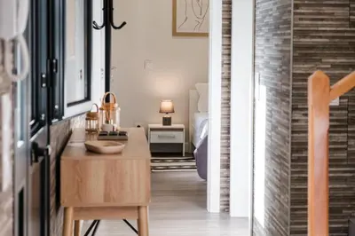 a small room with a desk and a bed at GuestReady - Tranquil Hideaway near Funchal in Funchal