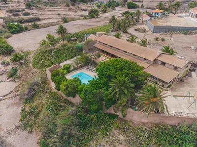 an aerial view of a house with a swimming pool at Alojamento Casas da Serra in Porto Santo