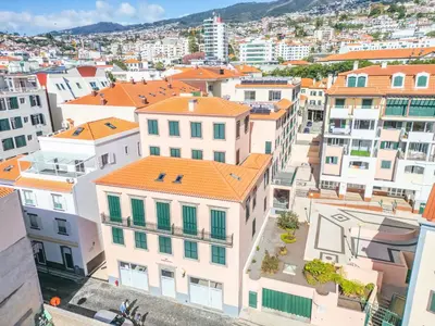 an aerial view of a city with buildings at Carmo Heritage Apartments in Funchal