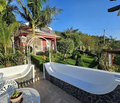 a bath tub in the yard of a house at Villa River Ponta do Sol by Rentallido in Canhas