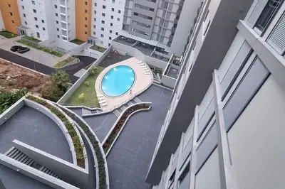 an overhead view of a swimming pool in a building at Fantástico apartamento na zona nobre - Bella Vita in Funchal