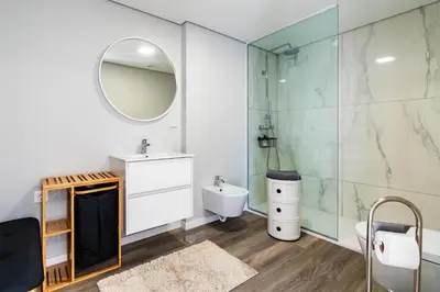 a bathroom with a sink and a mirror at Terrace in Carmo in Funchal