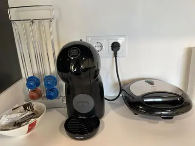 a black blender sitting on top of a counter at Sunset Valley House in Ribeira Brava