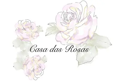 a wreath of pink roses on a white background at Casa das Rosas in Funchal