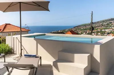 a house with a view of the water at MemorHia Village by OurMadeira in Calheta