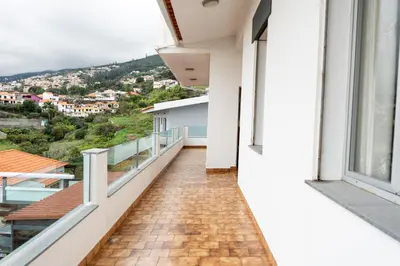 a balcony of a house with a view at Atlantic View Residence in Funchal